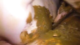 Woman eats shit from a bowl