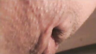 Woman spreads her ass cheeks with a blob of shit hanging out