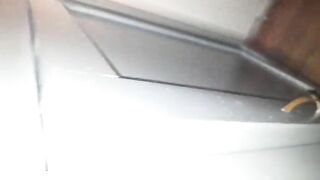 Woman uses various sex toys on the floor