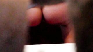 Woman squats and pisses into a toilet