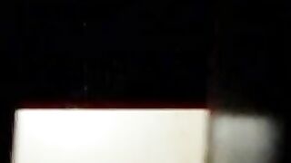 Woman squats and pisses into a toilet