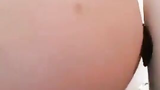Woman plays with her fresh shit in shower