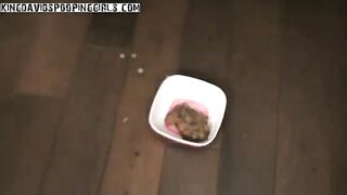 Girl takes a shit on the floor and plays with it