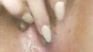 Woman finger fucks her asshole full of shit