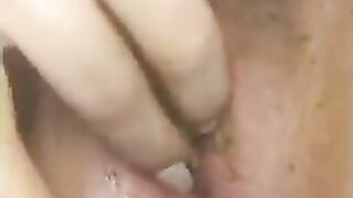 Woman finger fucks her asshole full of shit