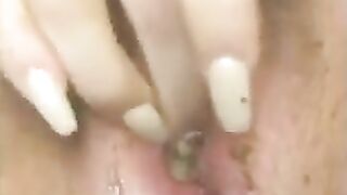 Woman finger fucks her asshole full of shit