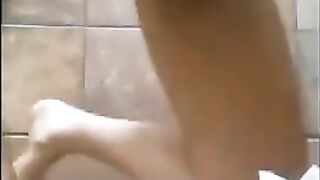Woman takes a massive shit in the bathtub
