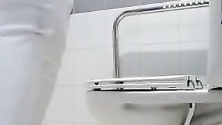 Girl takes a huge shit in public toilet stall
