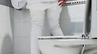 Girl takes a huge shit in public toilet stall