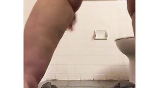 Girl squats over toilet and drops a big pile of shit
