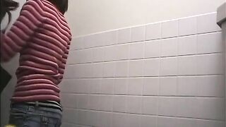 Girl taking a huge shit in a bathroom stall