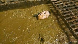 Woman swims in filthy shit and piss