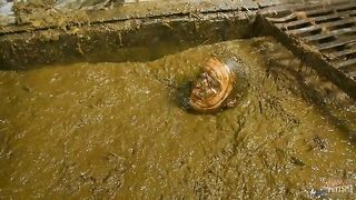 Woman swims in filthy shit and piss
