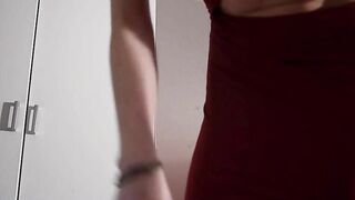 Woman plays with her ass in a mirror