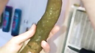 Girl pulls out a huge shit and holds it in her hand