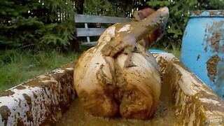 Woman covers her body in shit