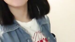 Woman takes a shit on bathroom floor while standing