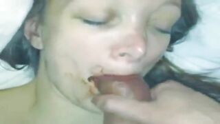 Close-up of a girl eating shit