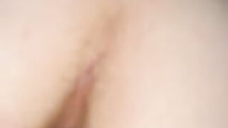 Hairy babe spreads her ass cheeks on the floor