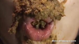 Eating and playing with her meal