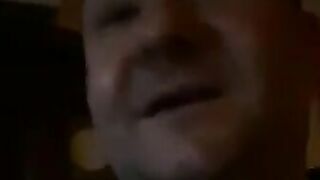 Woman pisses on the floor while eating a banana at the bar