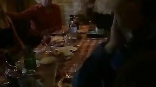 Woman pisses on the floor while eating a banana at the bar