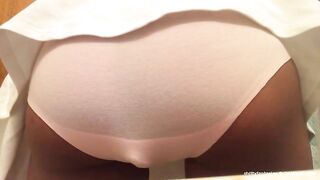Girl covers her ass with a towel, about to shit