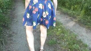 Girl does a big poop on a country lane 
