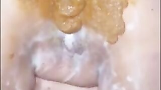 Brunette shits diarrhea on her face