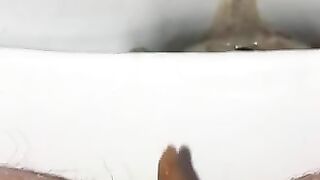 Bitch squatting over the toilet, pissing and shitting at the same time