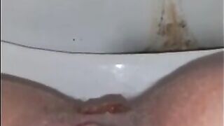 Girl squats over toilet and shits in it