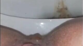 Girl squats over toilet and shits in it