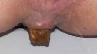 A filthy bitch drops a huge shit in the toilet