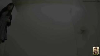 Girl takes a huge shit on a toilet in a bathroom