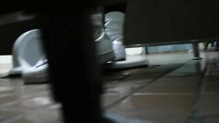 Girl squats on her haunches and shits on the floor