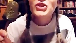 Lunatic babe eats a scatcicle