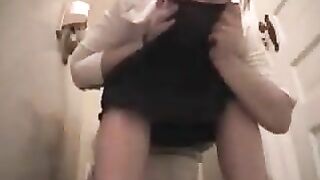 Blonde in a schoolgirl outfit takes a huge shit on a toilet