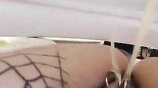 Girl with tattooed ass fucks herself with a dildo