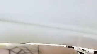 Girl with tattooed ass fucks herself with a dildo