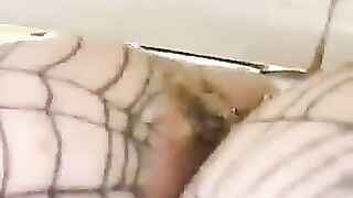 Woman squats on a cage and takes a shit in it