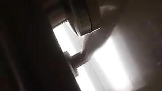 Horny woman in stockings squats over flushing toilet