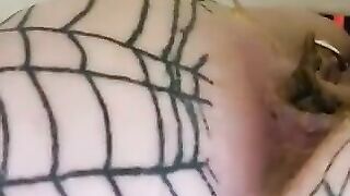 Horny woman in stockings squats over flushing toilet