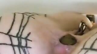 Woman with spiderweb tattoos takes a shit on her ass