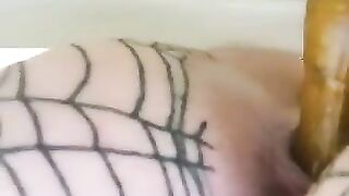 Slut takes a shit in her fishnet stockings