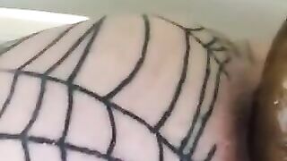 Slut stretches her fishnet-clad ass in closeup