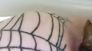 Slut stretches her fishnet-clad ass in closeup