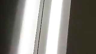 Girl pushes some shit out of her ass while wearing a fishnet body stocking.