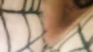 Girl pushes some shit out of her ass while wearing a fishnet body stocking.
