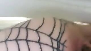Girl wearing fishnet stockings and shaved pussy rims ass on net