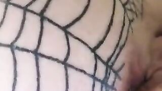 Girl gets her asshole pierced while wearing a fishnet body suit